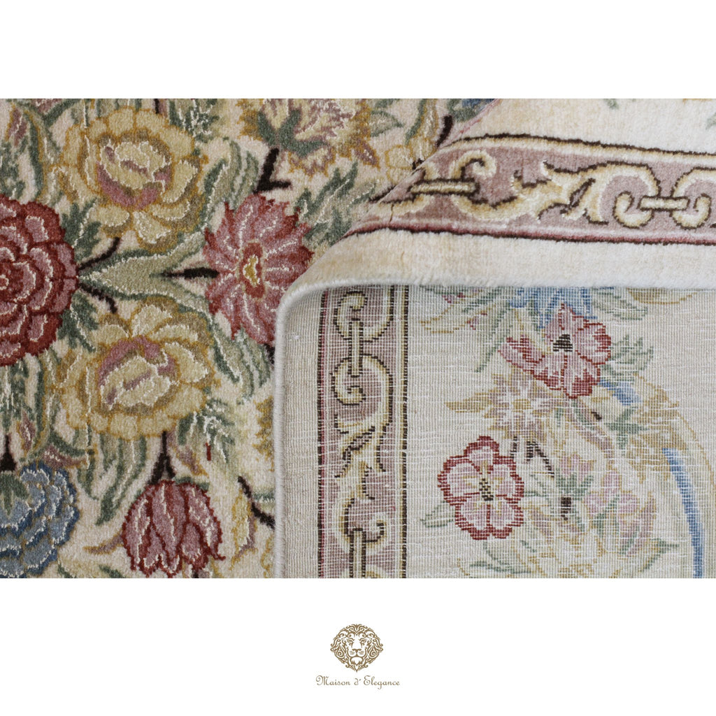 Close-up of a floral patterned rug with intricate designs.