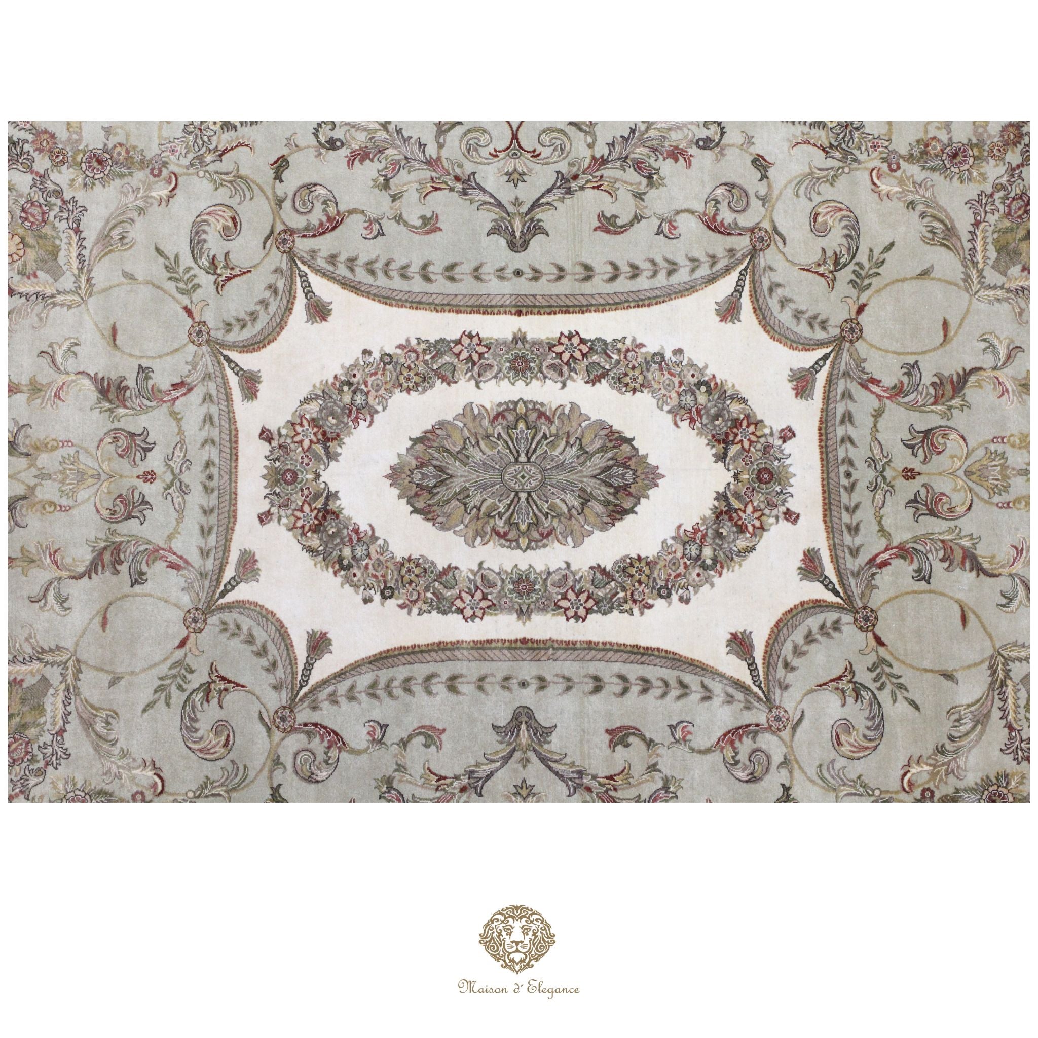 Decorative patterned rug with intricate designs on a green background