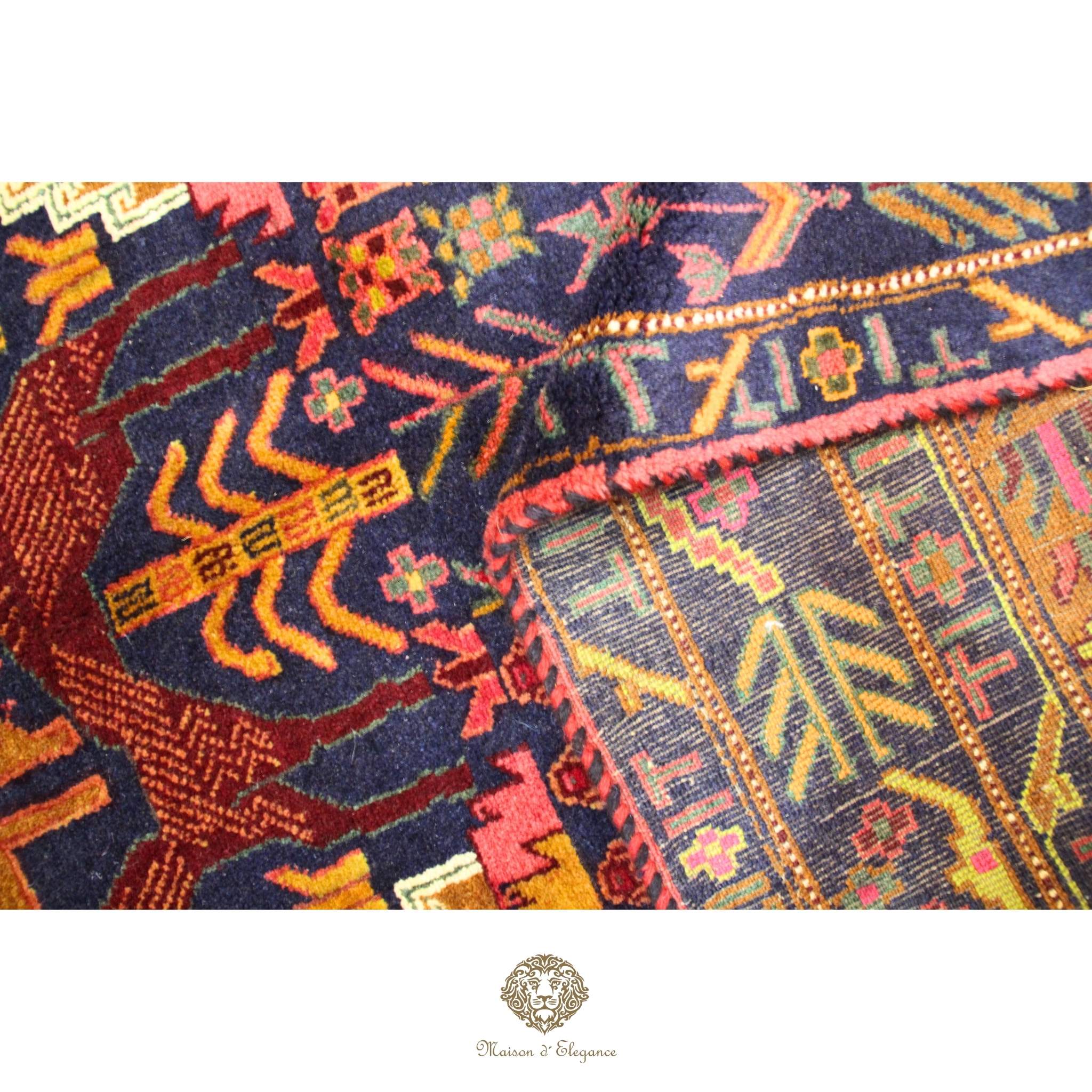Close-up of a colorful patterned rug with intricate designs.