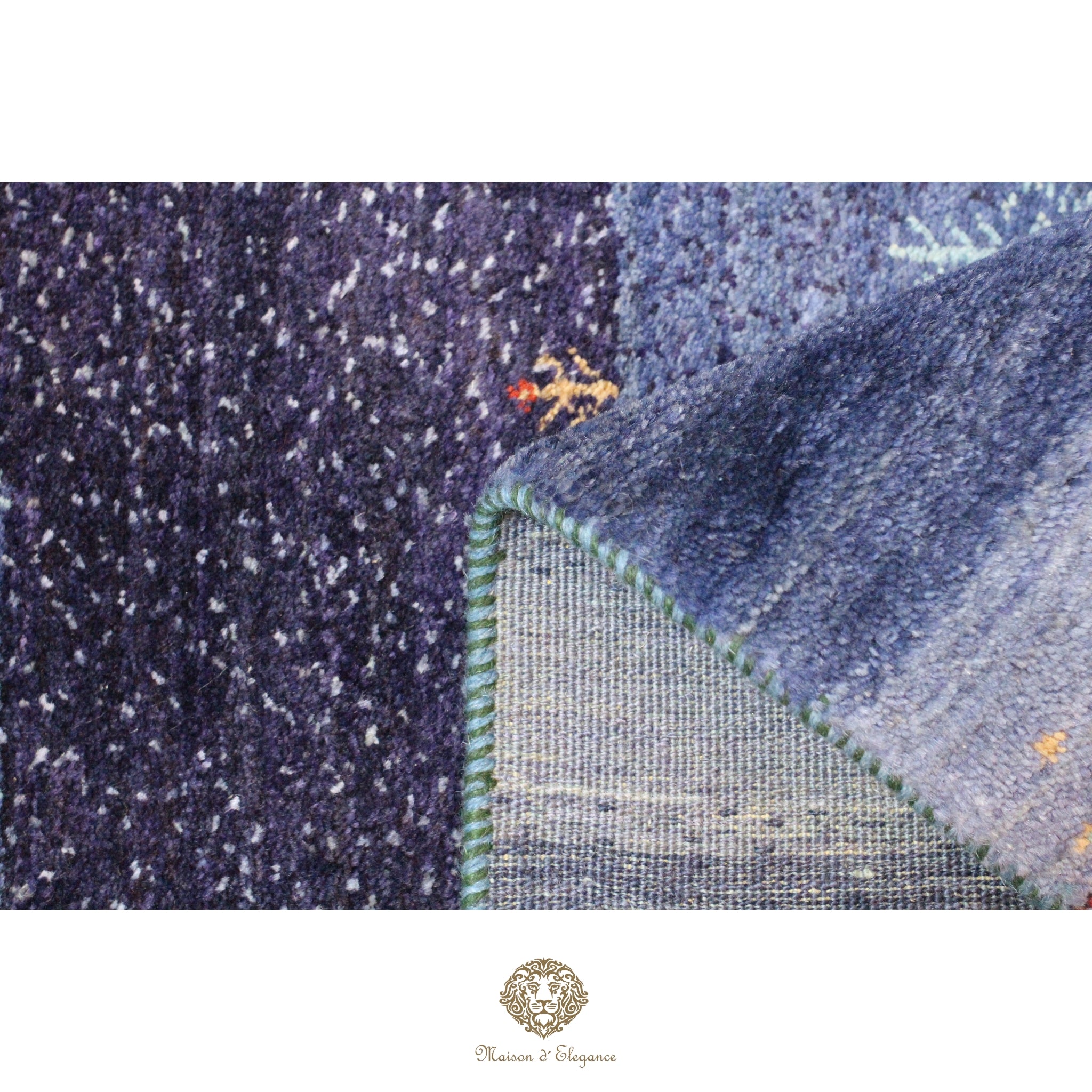 Close-up of a textured fabric with a pattern, featuring a brand logo at the bottom.