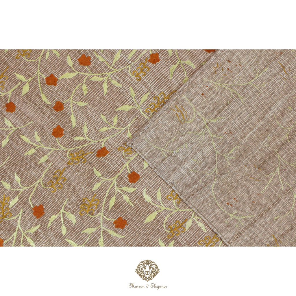 Textile with floral pattern on a beige background