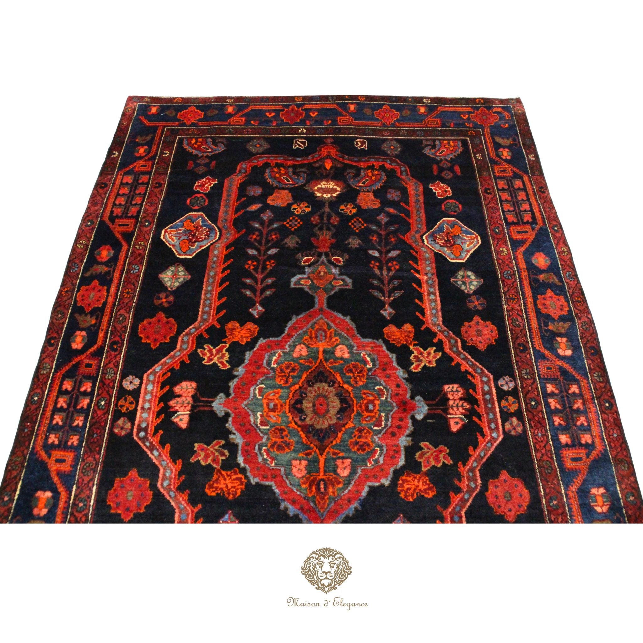Decorative rug with intricate patterns on a navy background