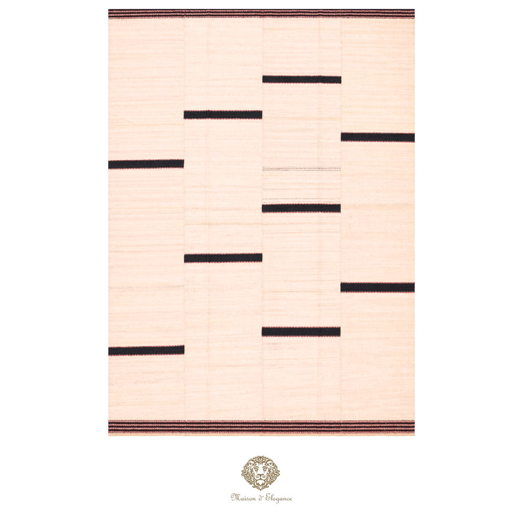 Beige rug with black geometric patterns on a white background
