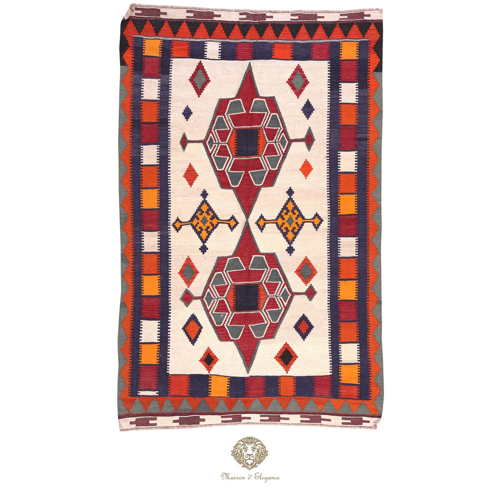 Woven blanket with geometric pattern on a white background