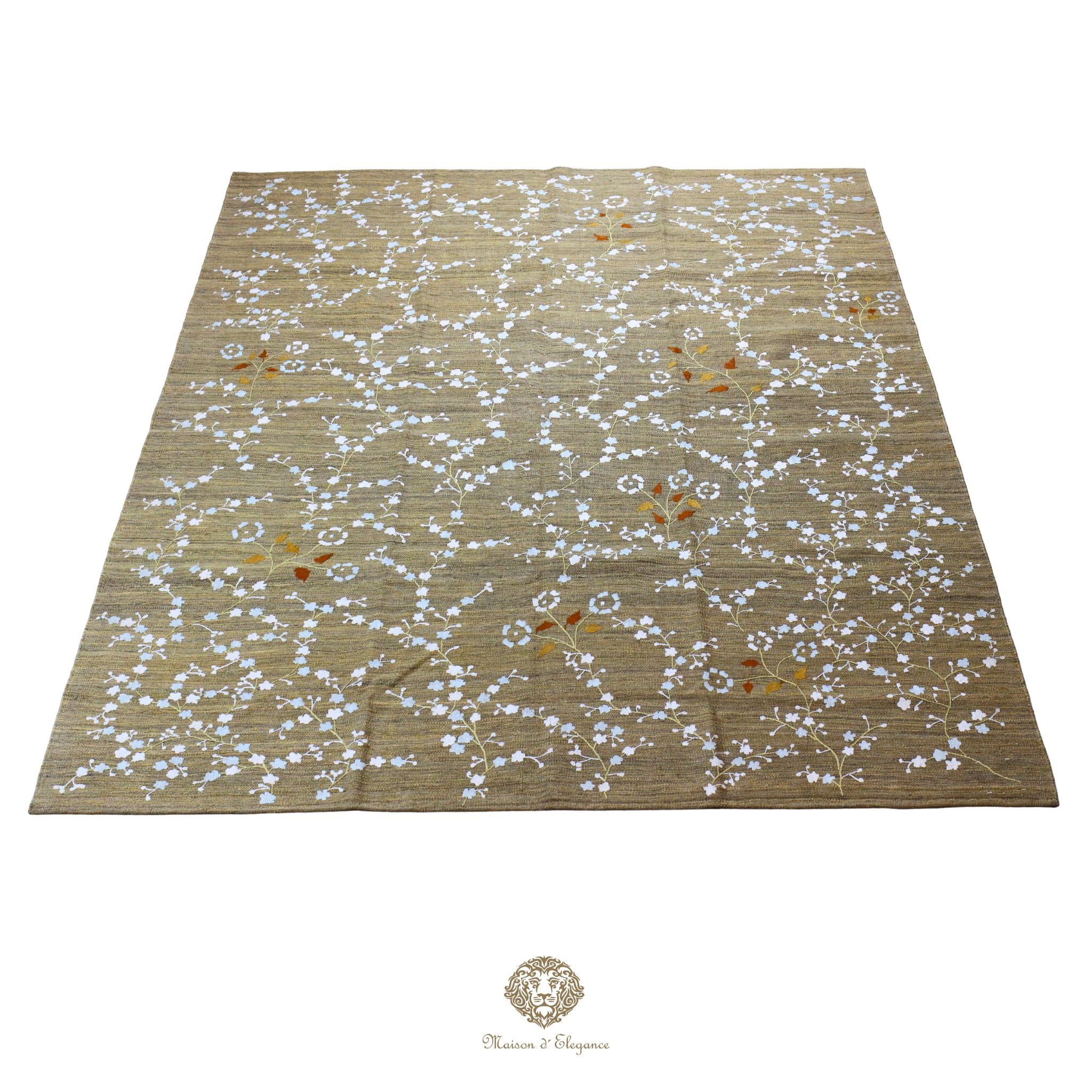 Beige rug with white floral pattern on a beige background