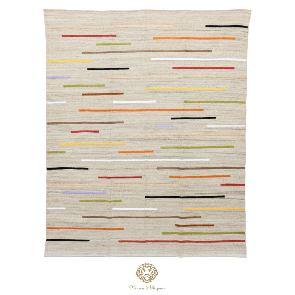 Beige rug with colorful geometric pattern on a white background