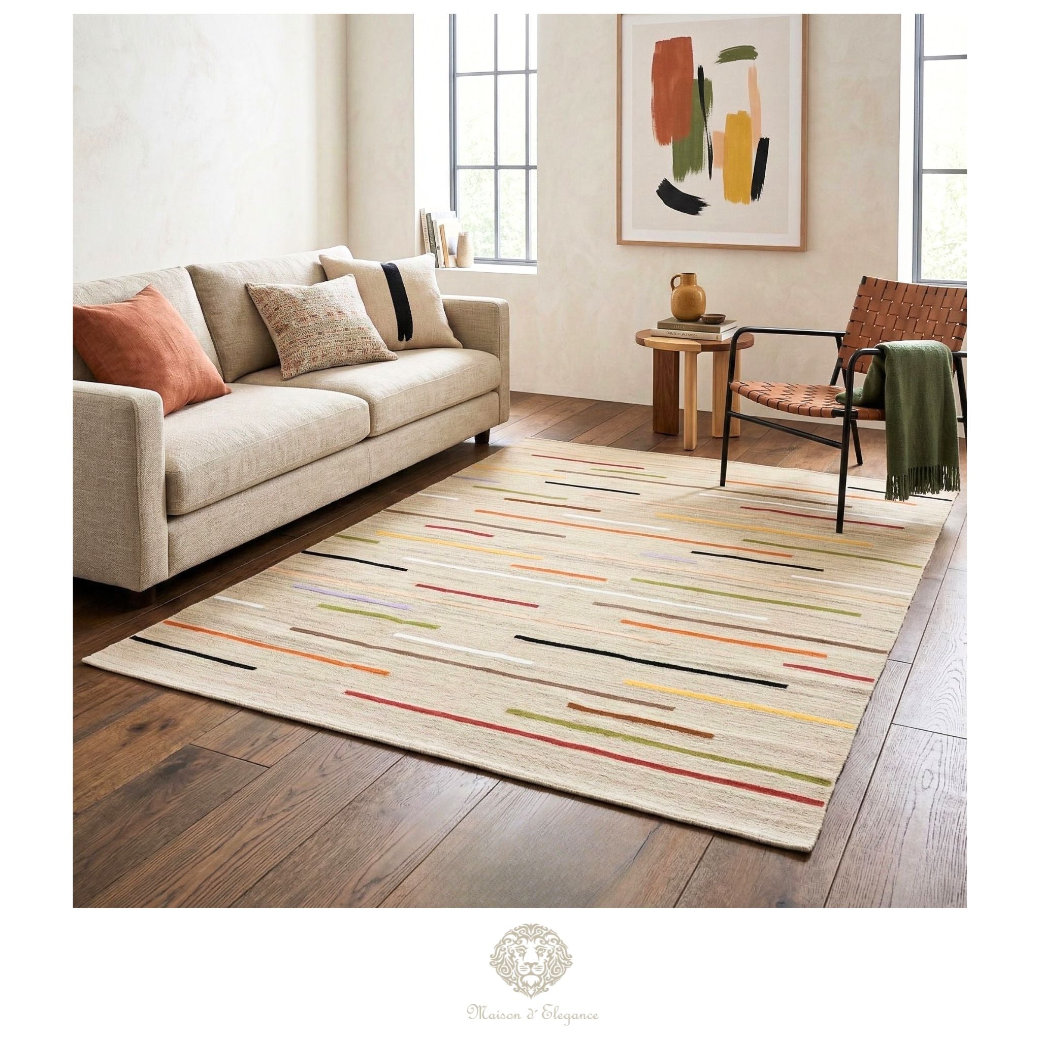 Living room with a striped area rug, sofa, and chair.
