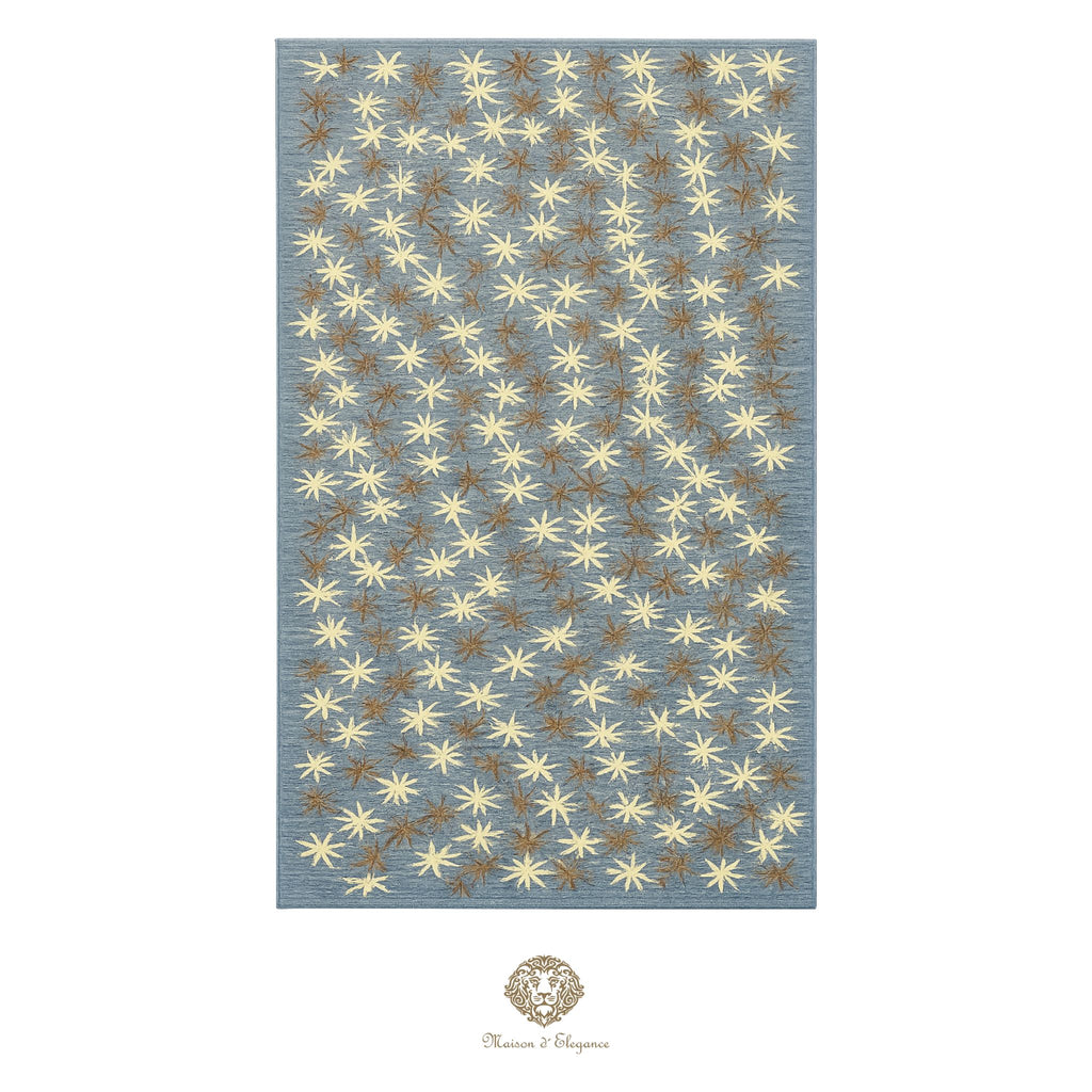 Patterned rug with star design on a blue background