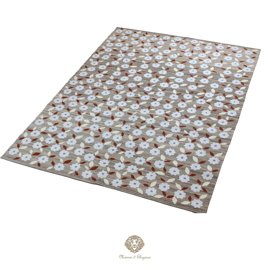 Floral patterned rug on a white background