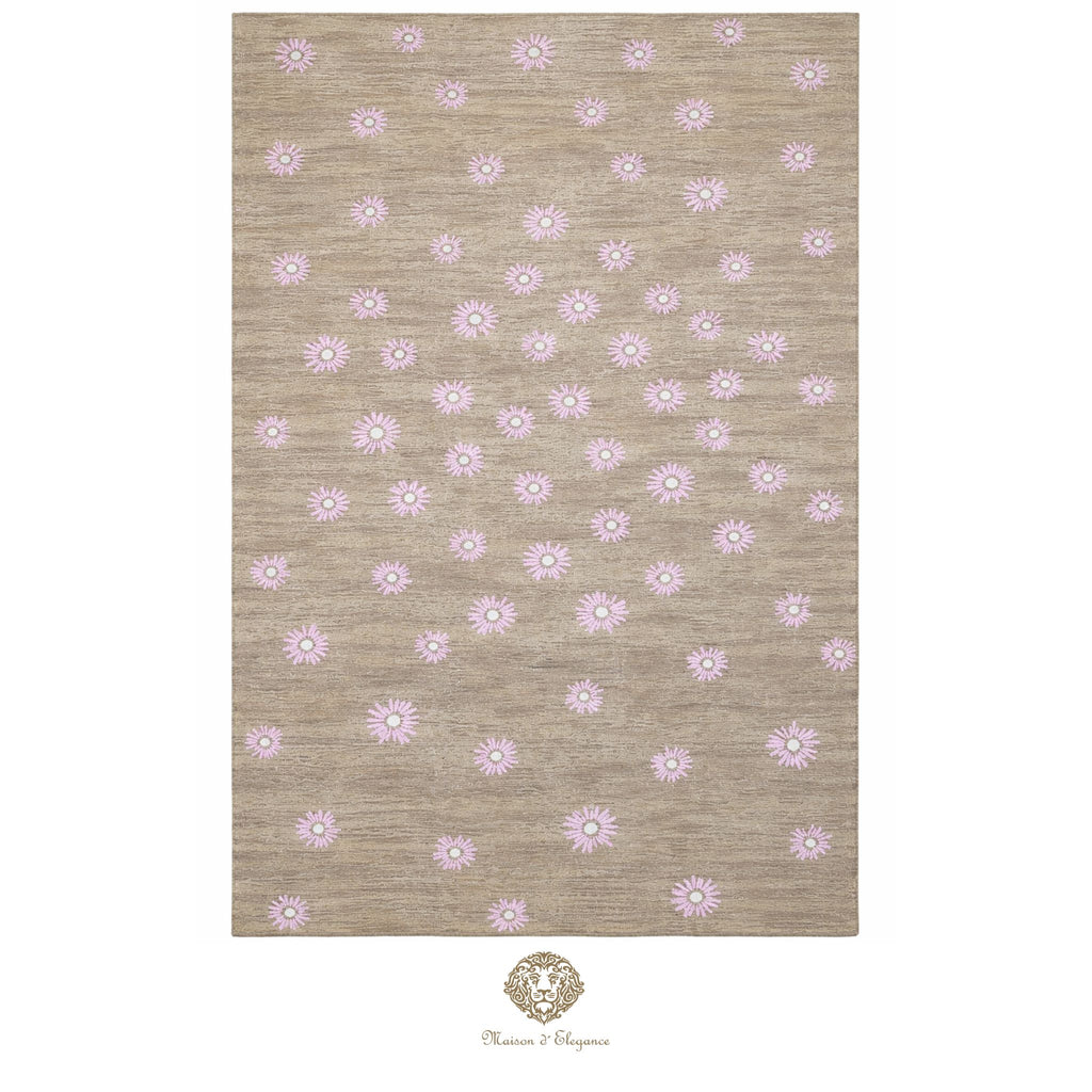 Beige rug with pink floral pattern on a white background