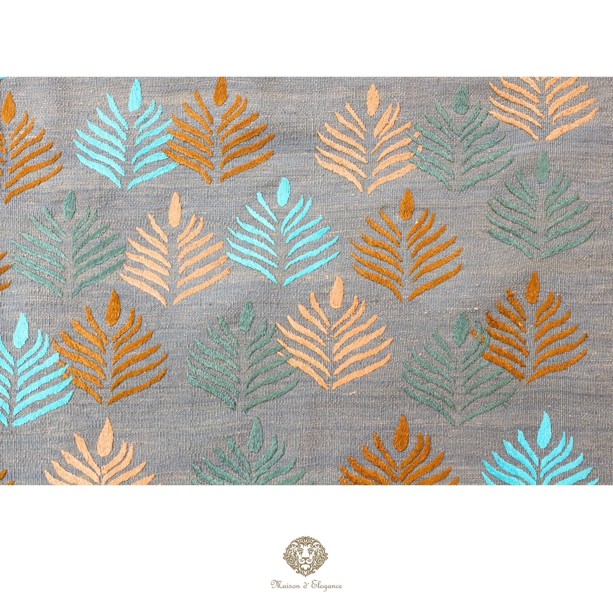 Patterned fabric with leaf design on a gray background