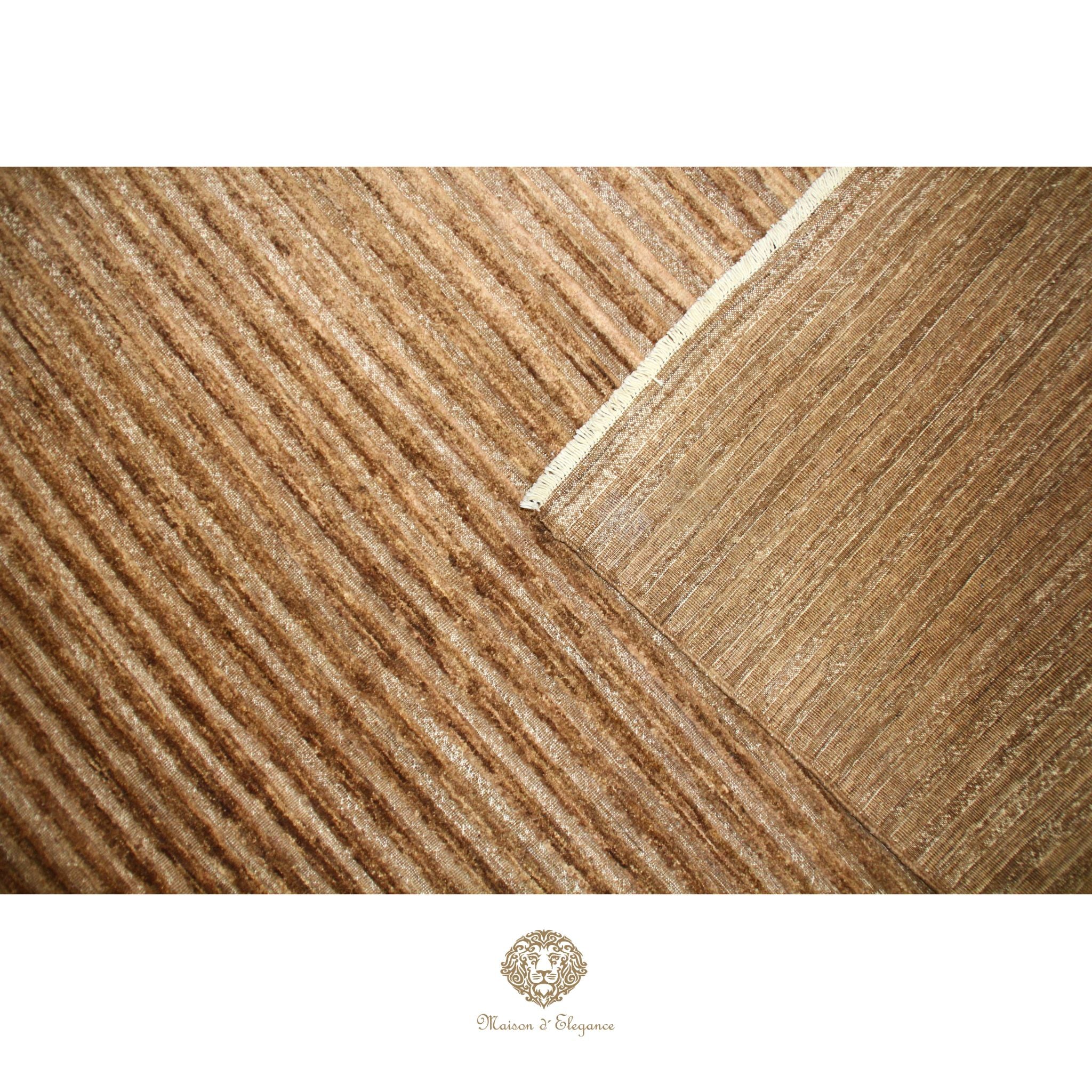Close-up of a wooden floor with a visible grain pattern, featuring the brand 'Chateau de Chavagneux'.