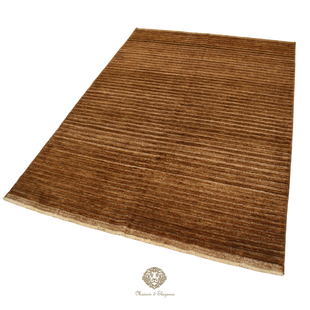 Brown textured rug on a brown background