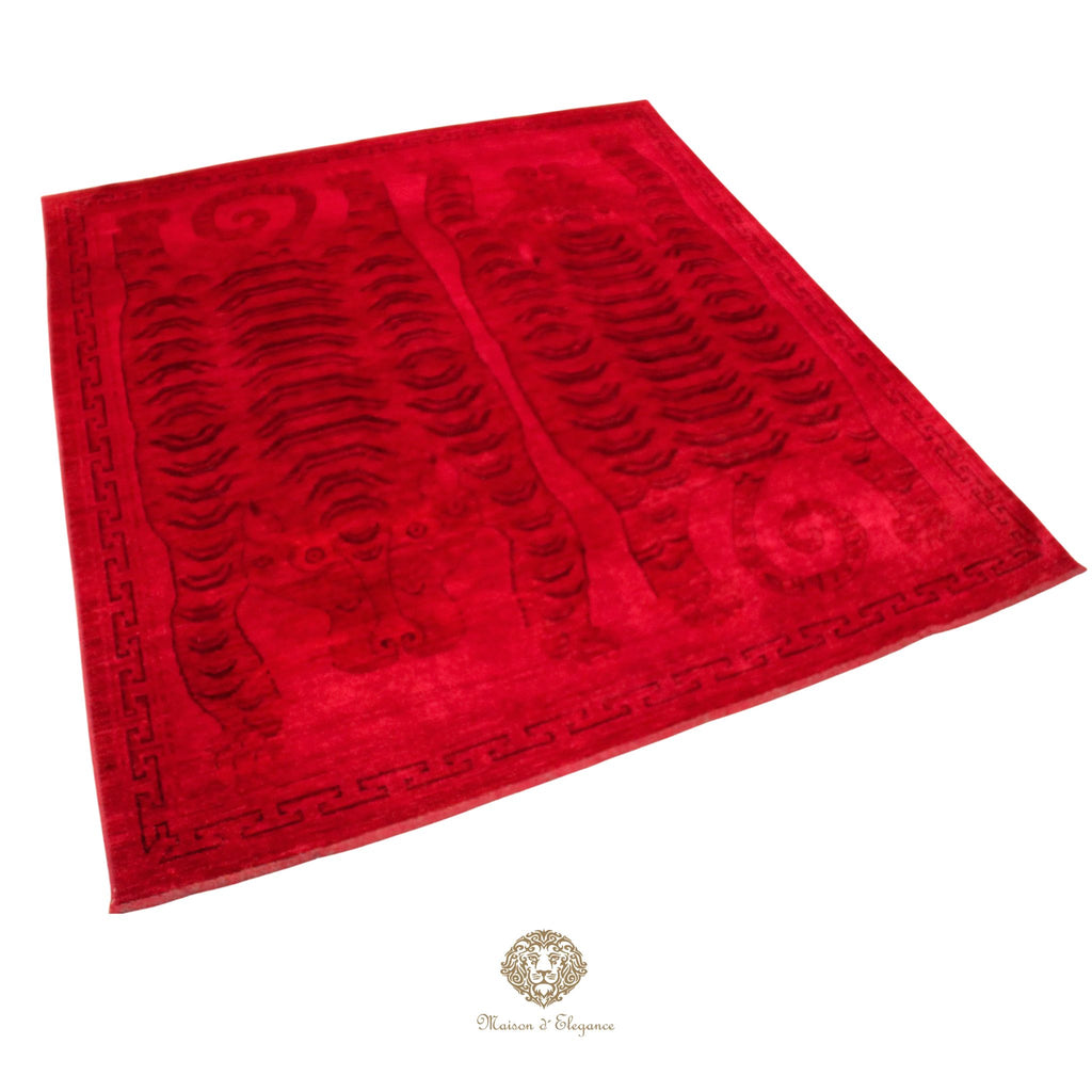 Red rug with black pattern on a red background