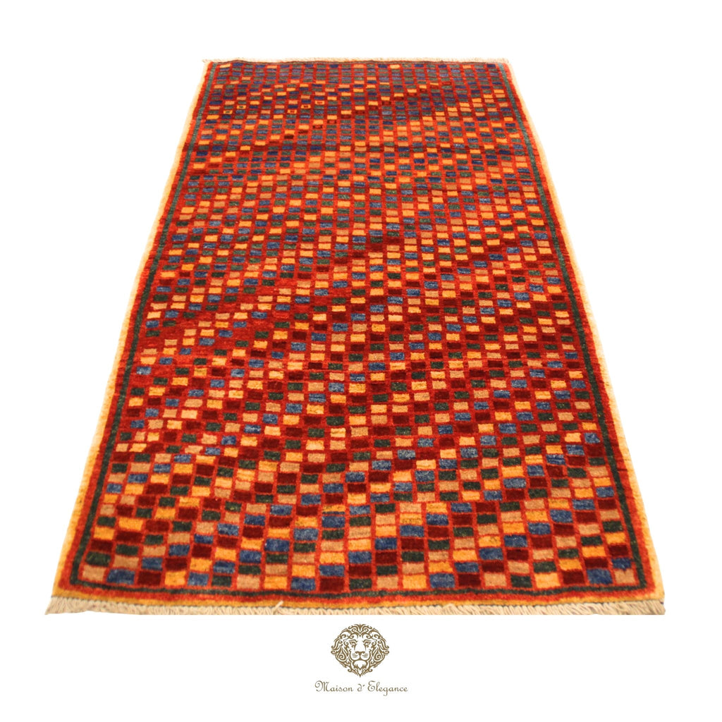 Decorative rug with a geometric pattern on a red background