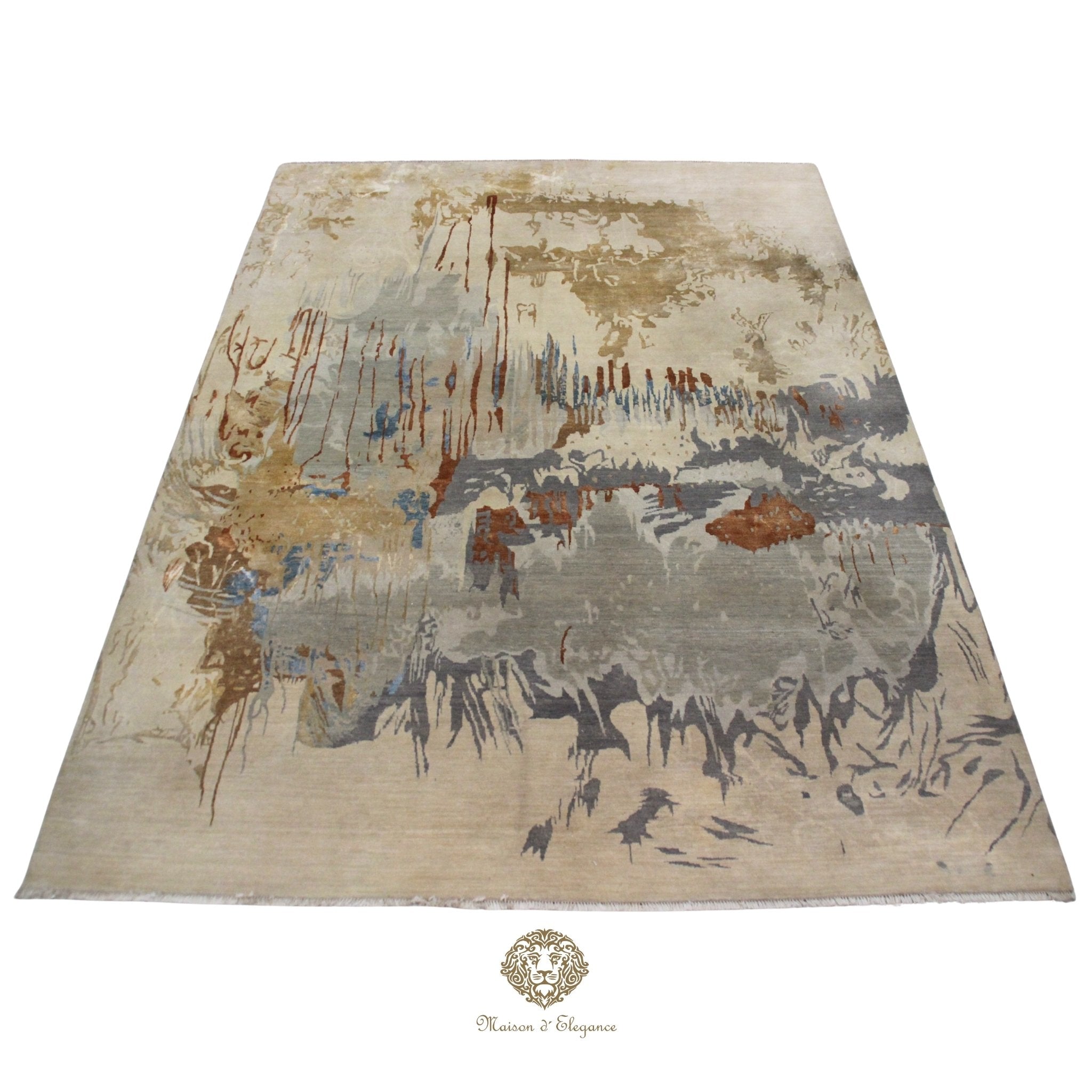 Abstract patterned rug with earthy tones on a Ivory background