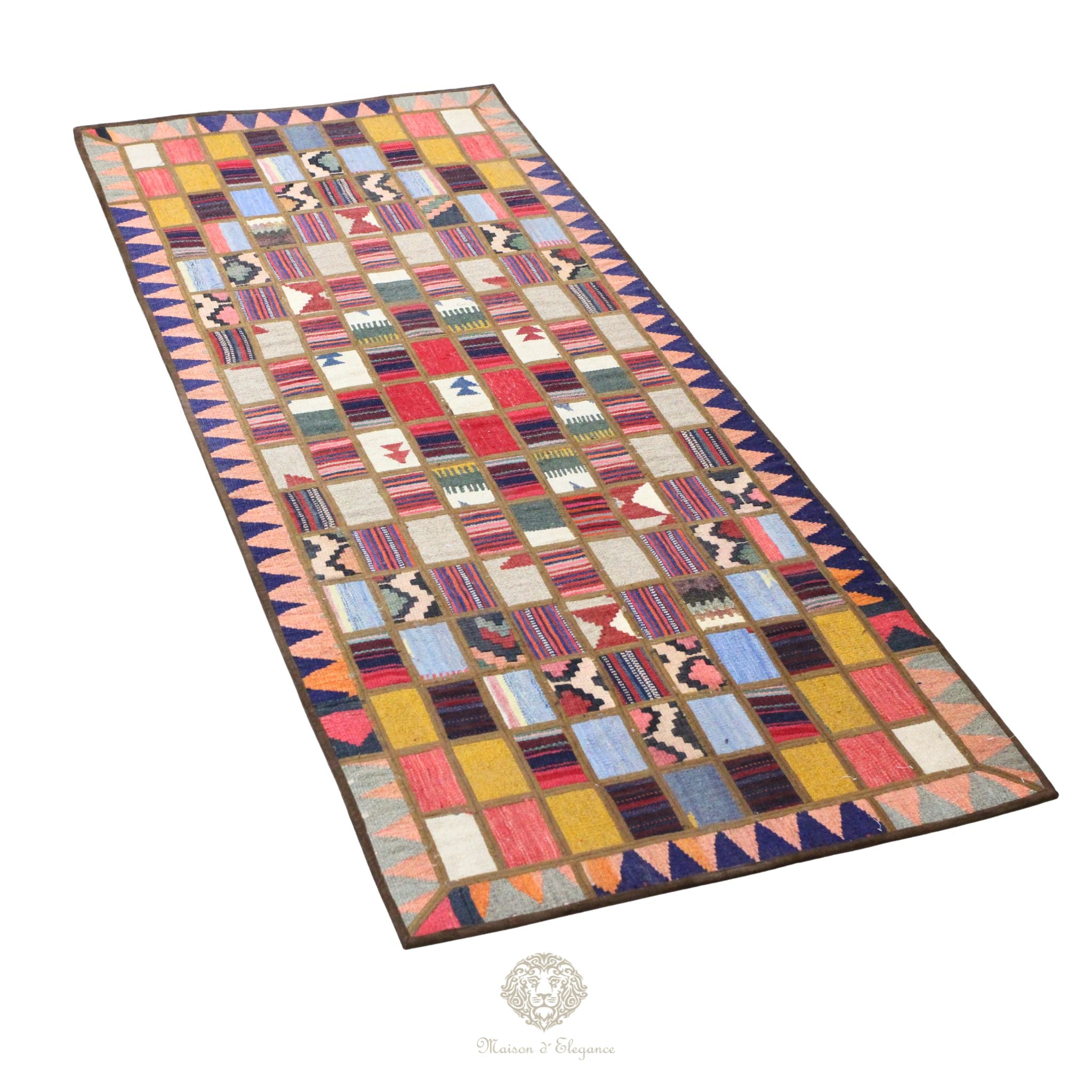 Multicolored patchwork rug on a white background