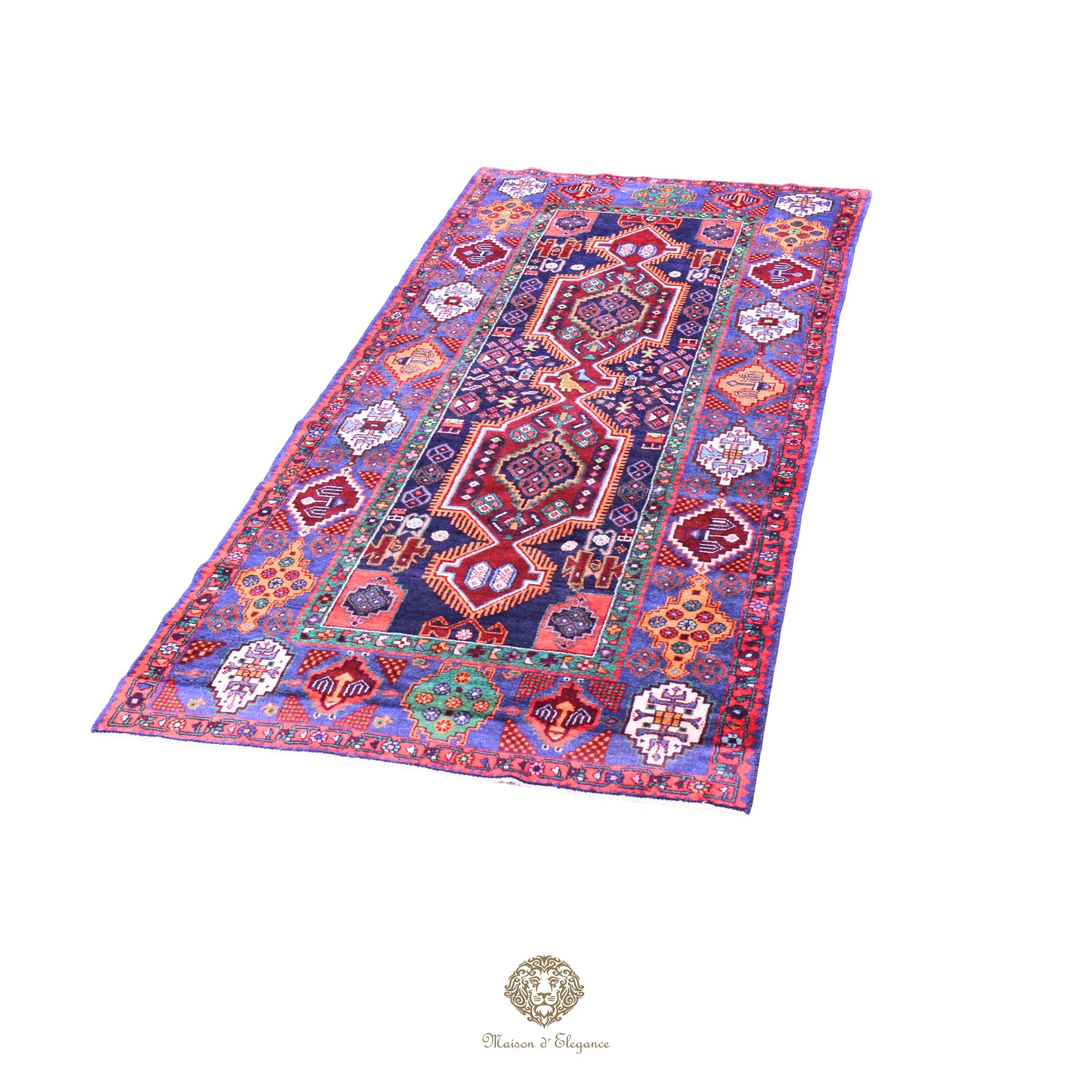 Decorative rug with intricate patterns on a navy background