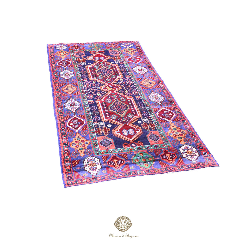 Colorful patterned rug on a navy background