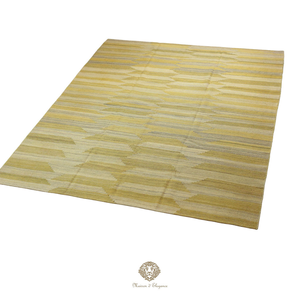 Yellow and beige striped rug on a white background