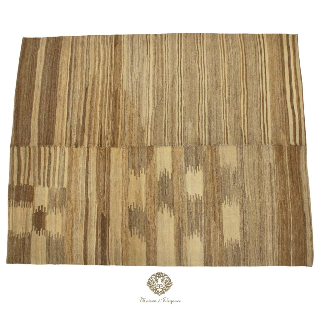 Textured fabric with brown and beige pattern on a ivory  background