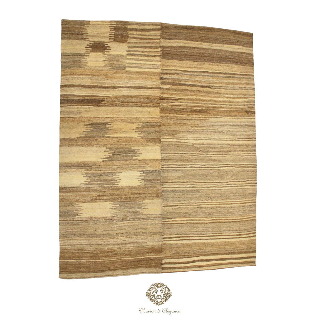 Patterned rug with a geometric design on a ivory background