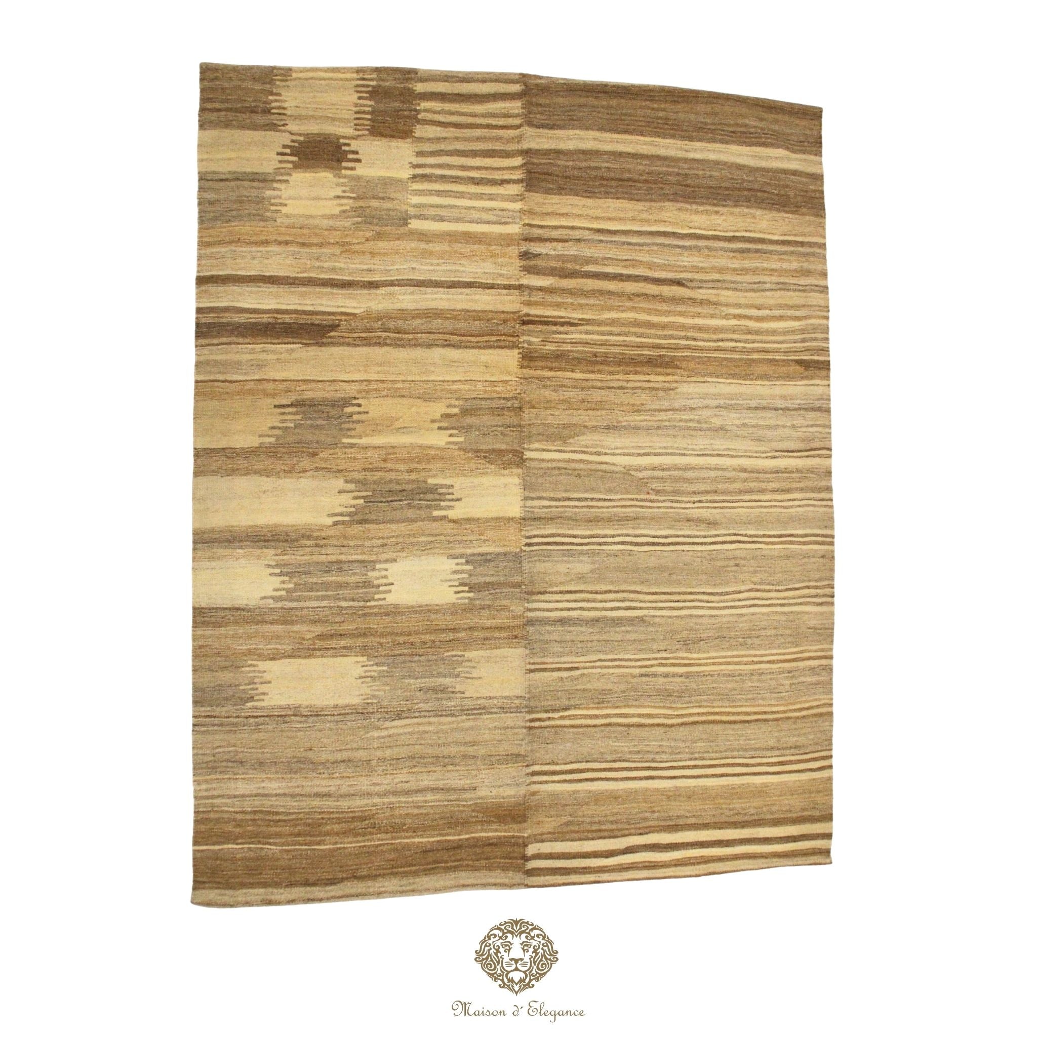 Patterned rug with a geometric design on a ivory background