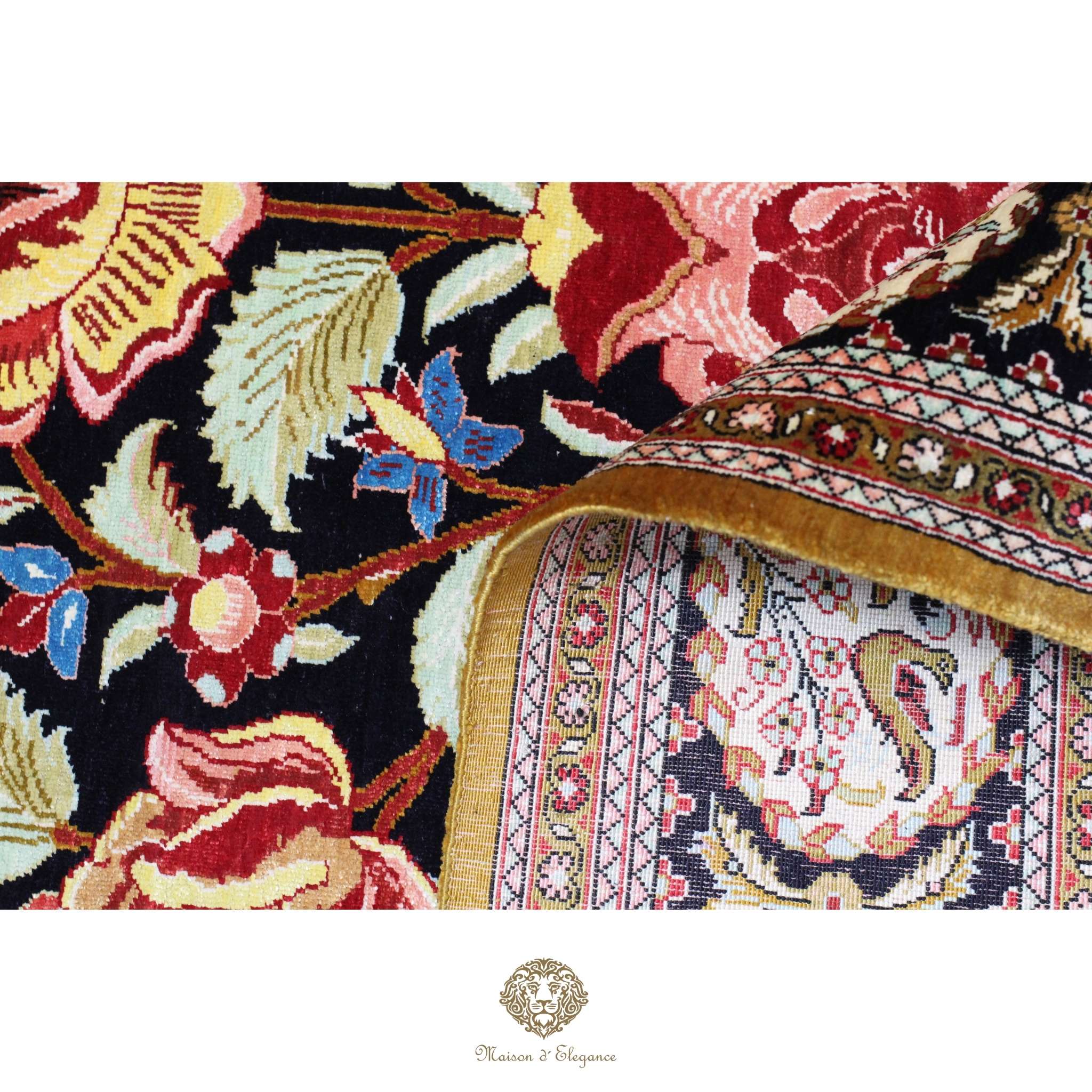 Close-up of a floral-patterned fabric with intricate designs on a black background.