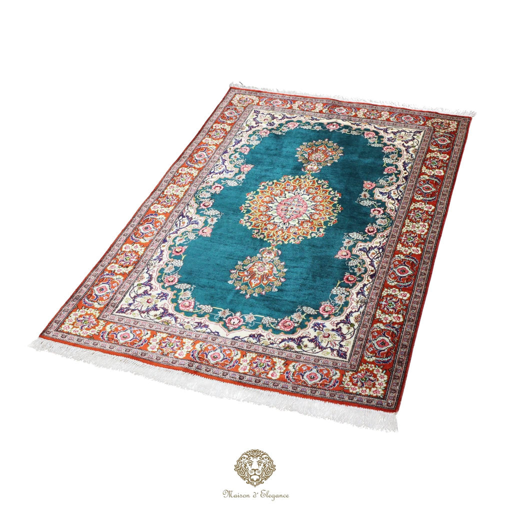 Decorative rug with intricate patterns on a torqouise background
