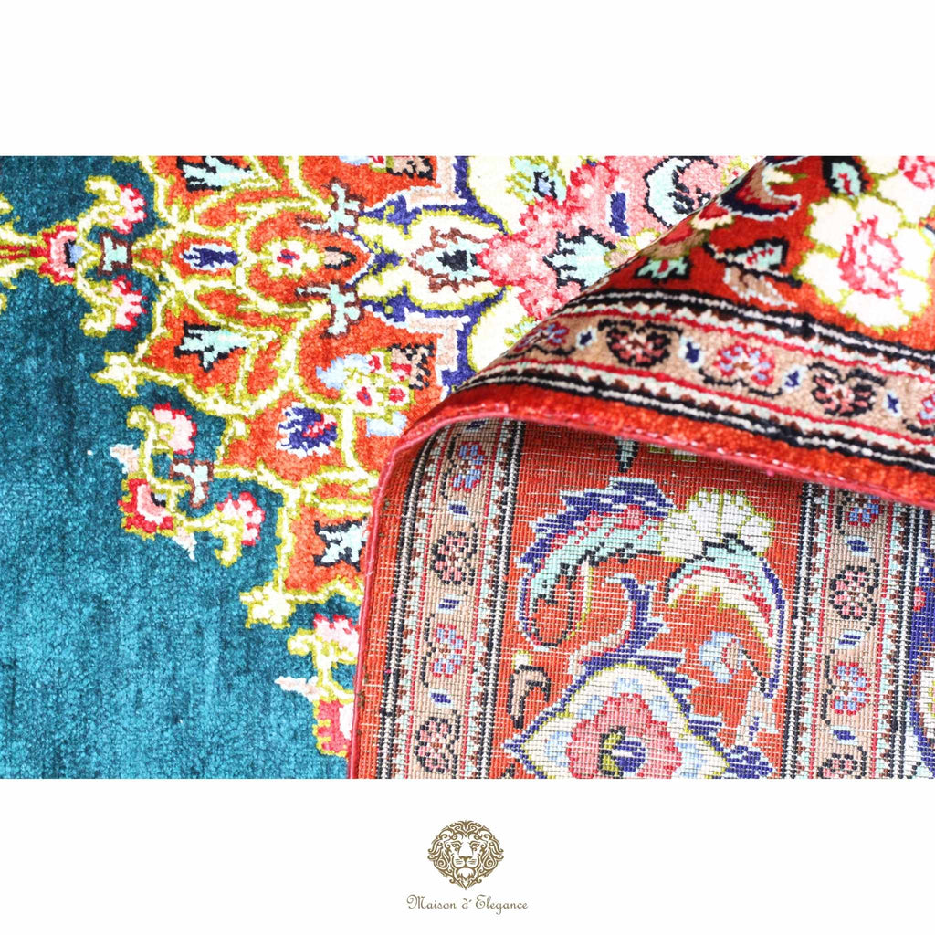 Close-up of a colorful patterned rug with intricate designs.
