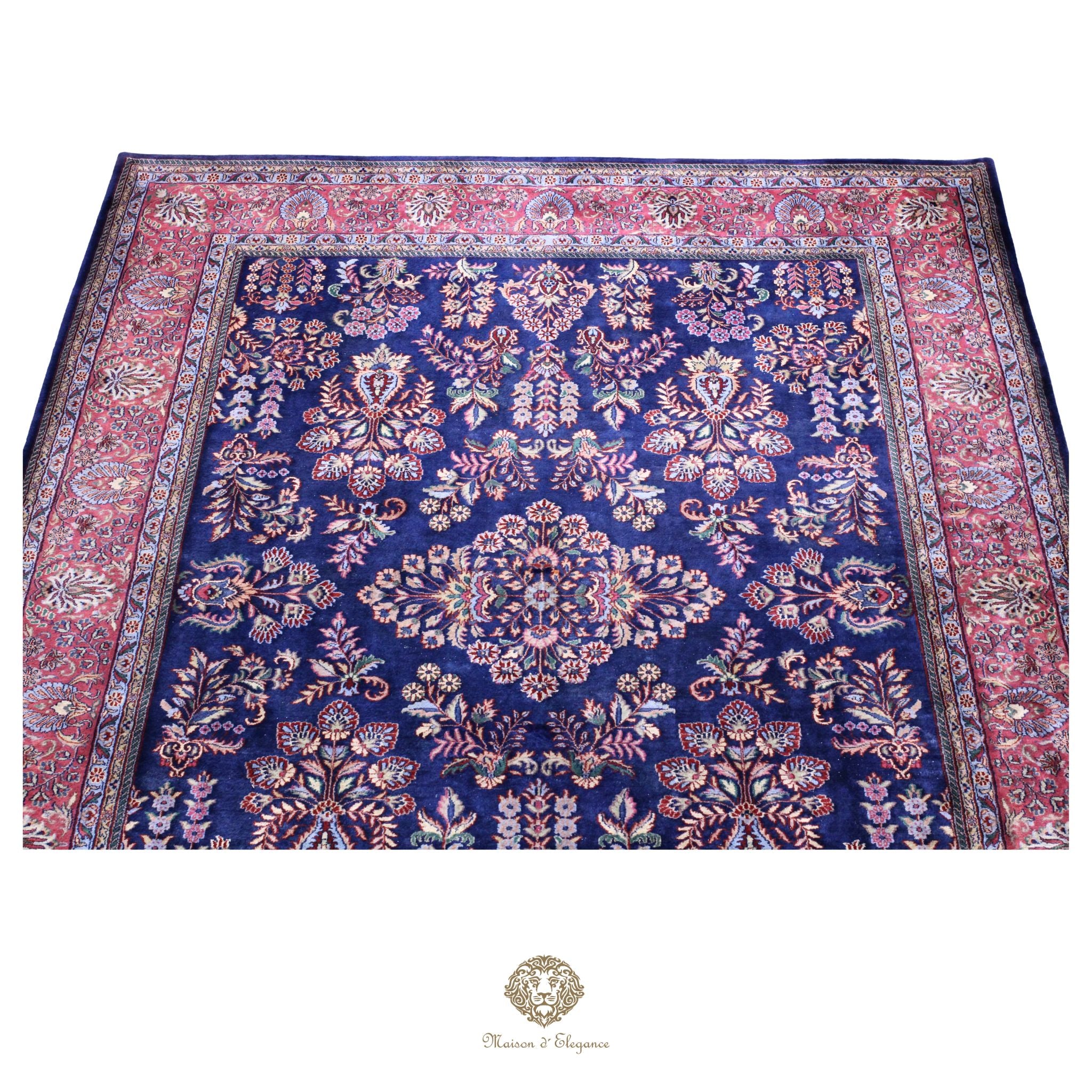 Decorative rug with intricate patterns on a navy background
