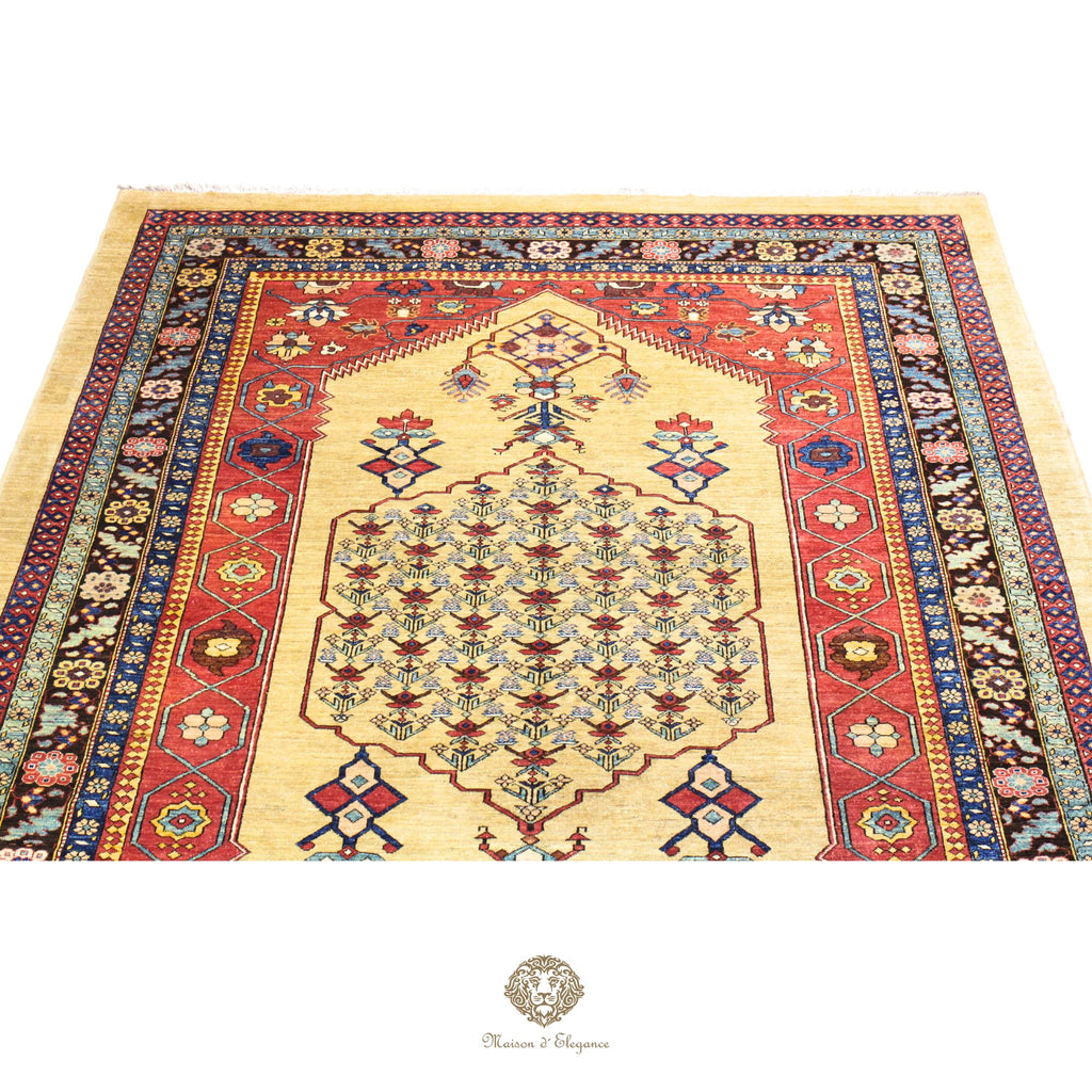 Decorative rug with intricate patterns on a wooden floor