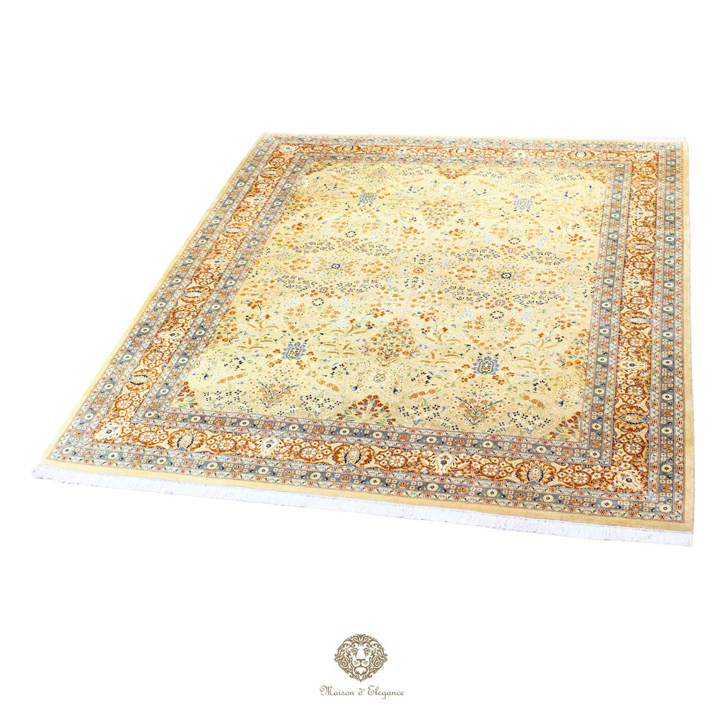 Decorative rug with intricate patterns on a gold background