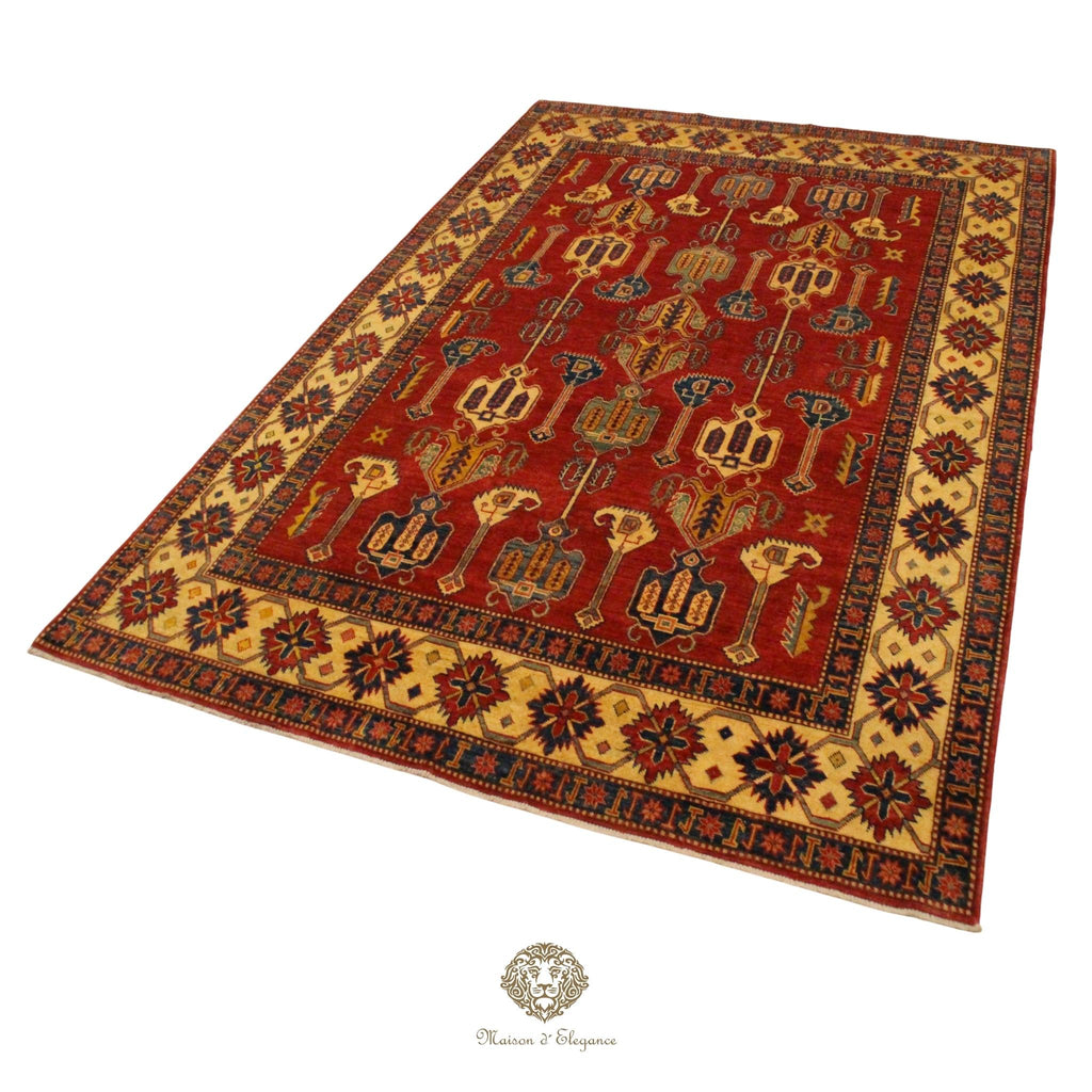 Decorative rug with intricate patterns on a Burgundy background