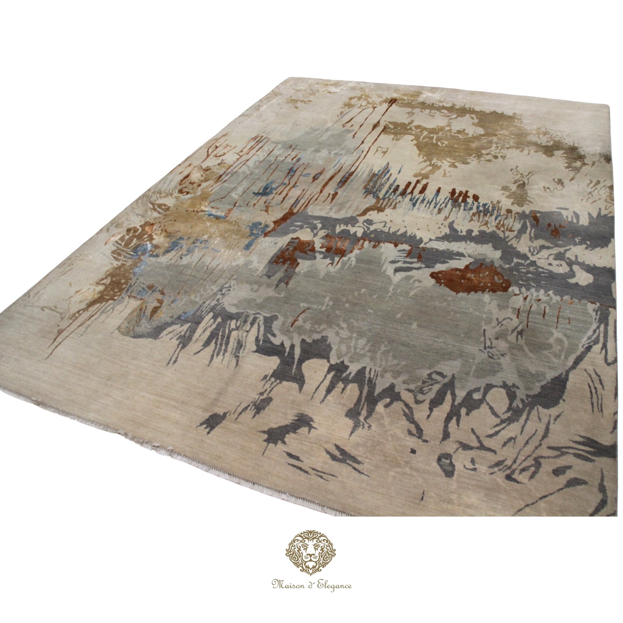 Abstract patterned rug with brown, beige, and gray colors on a Ivory background