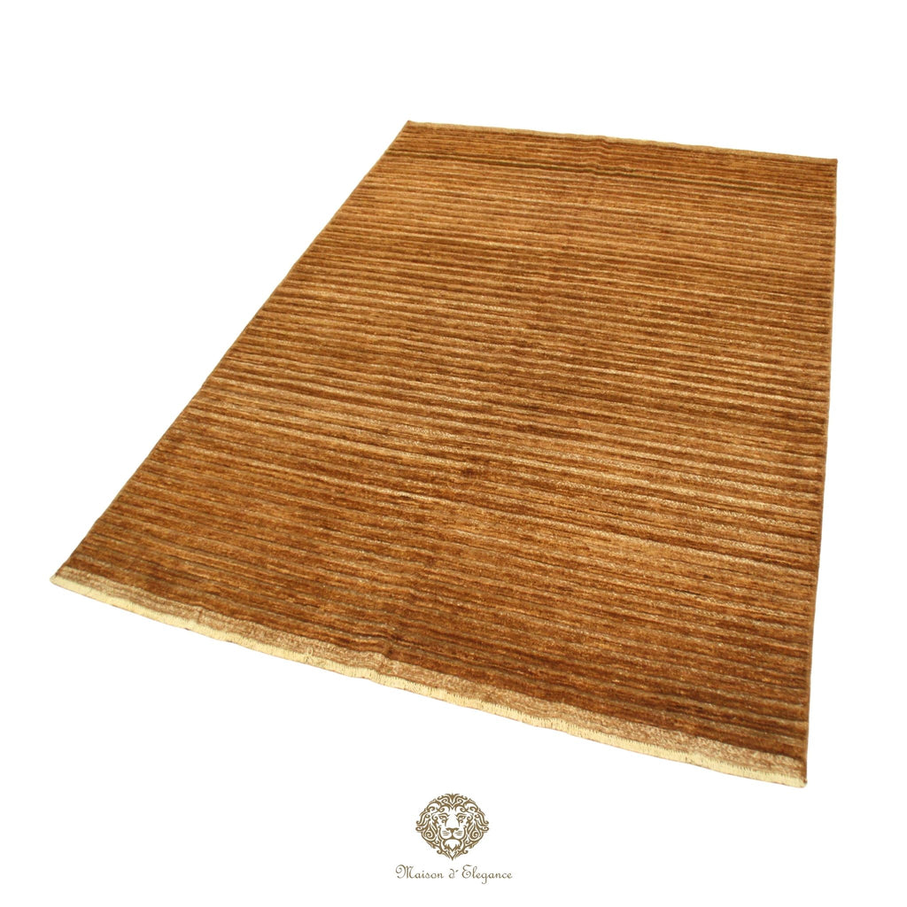 Brown textured rug on a brown striped background