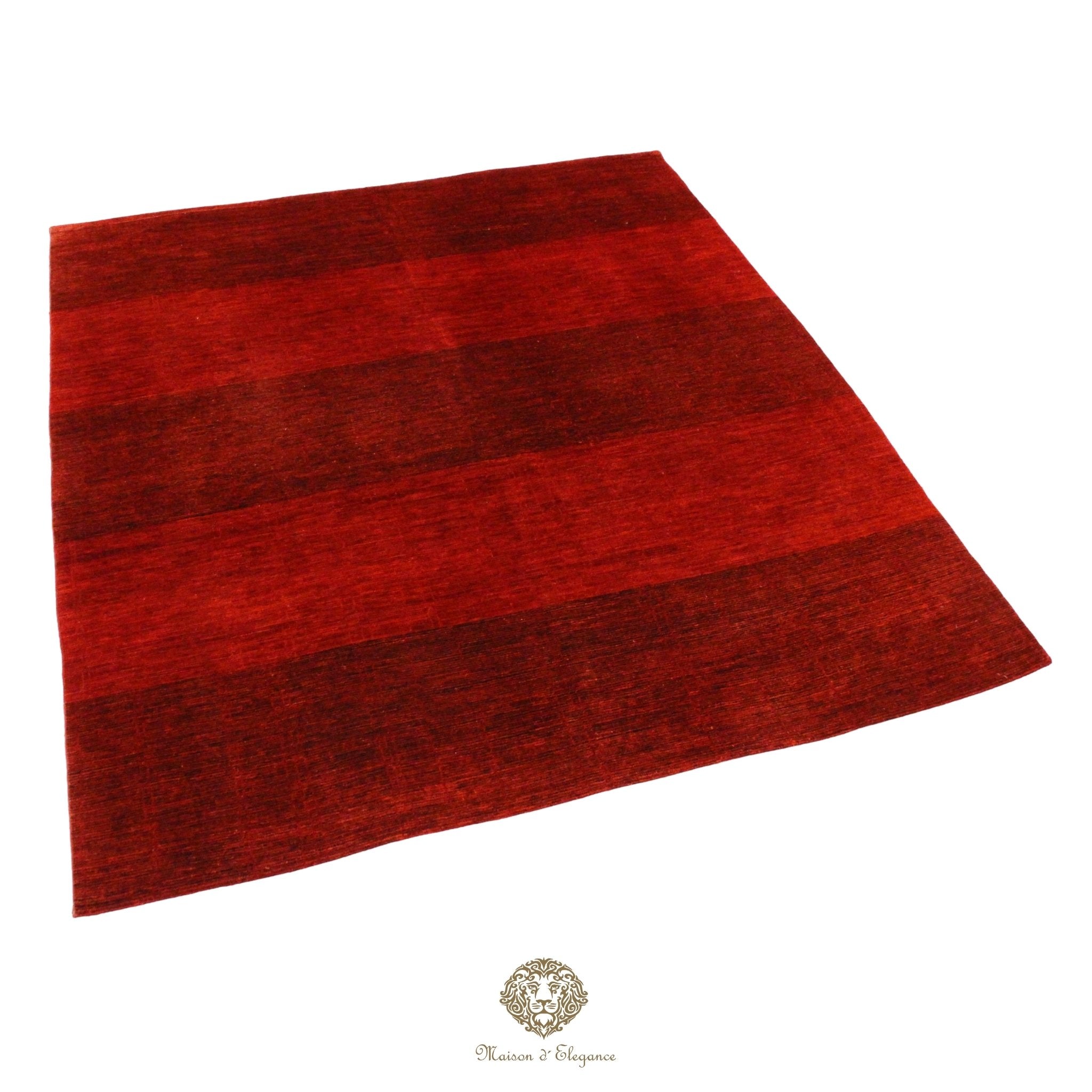 Red rug with a textured pattern on a red background