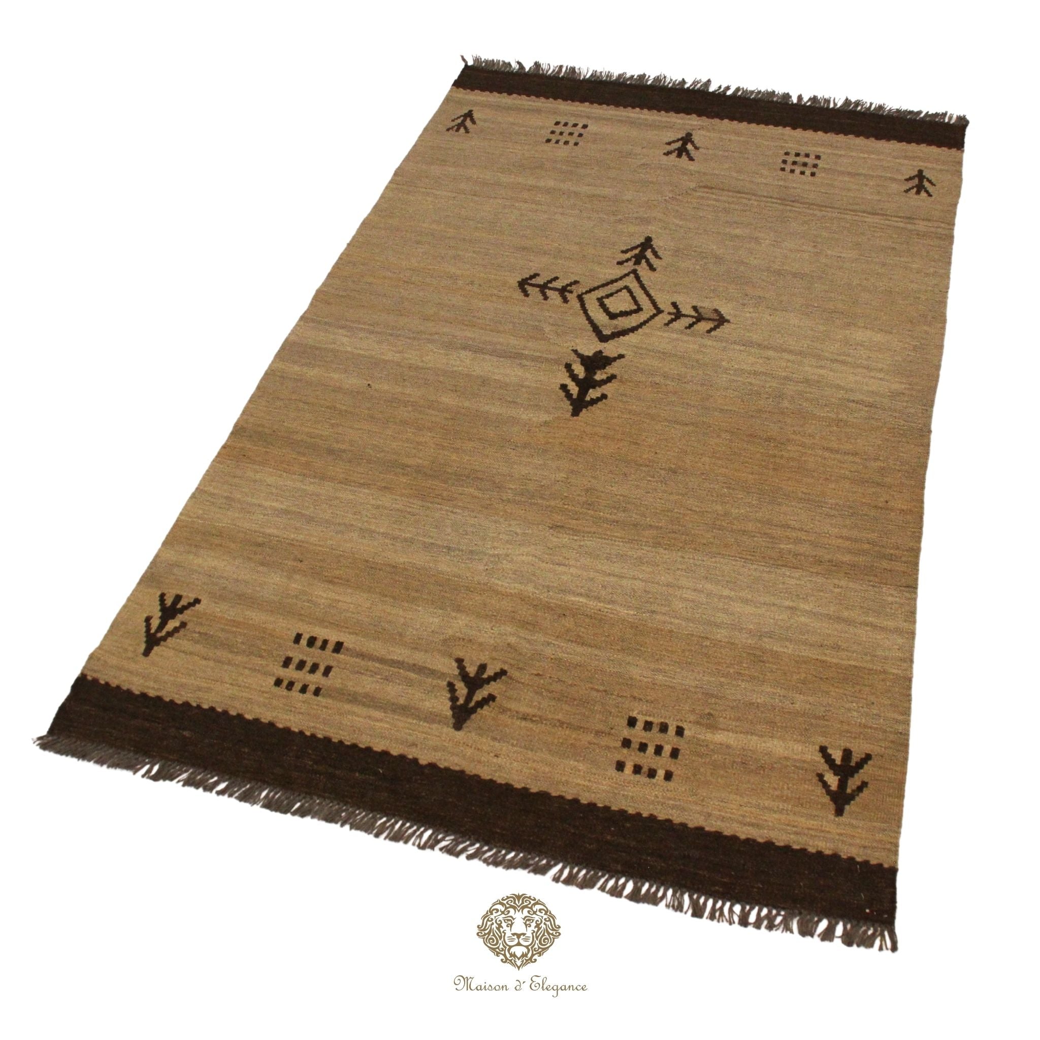 Beige rug with black patterns on a ivory background