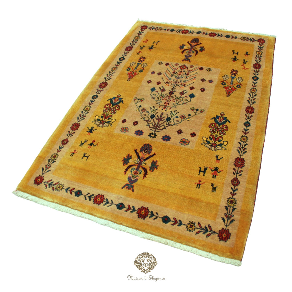 Decorative rug with intricate patterns on a  gold background