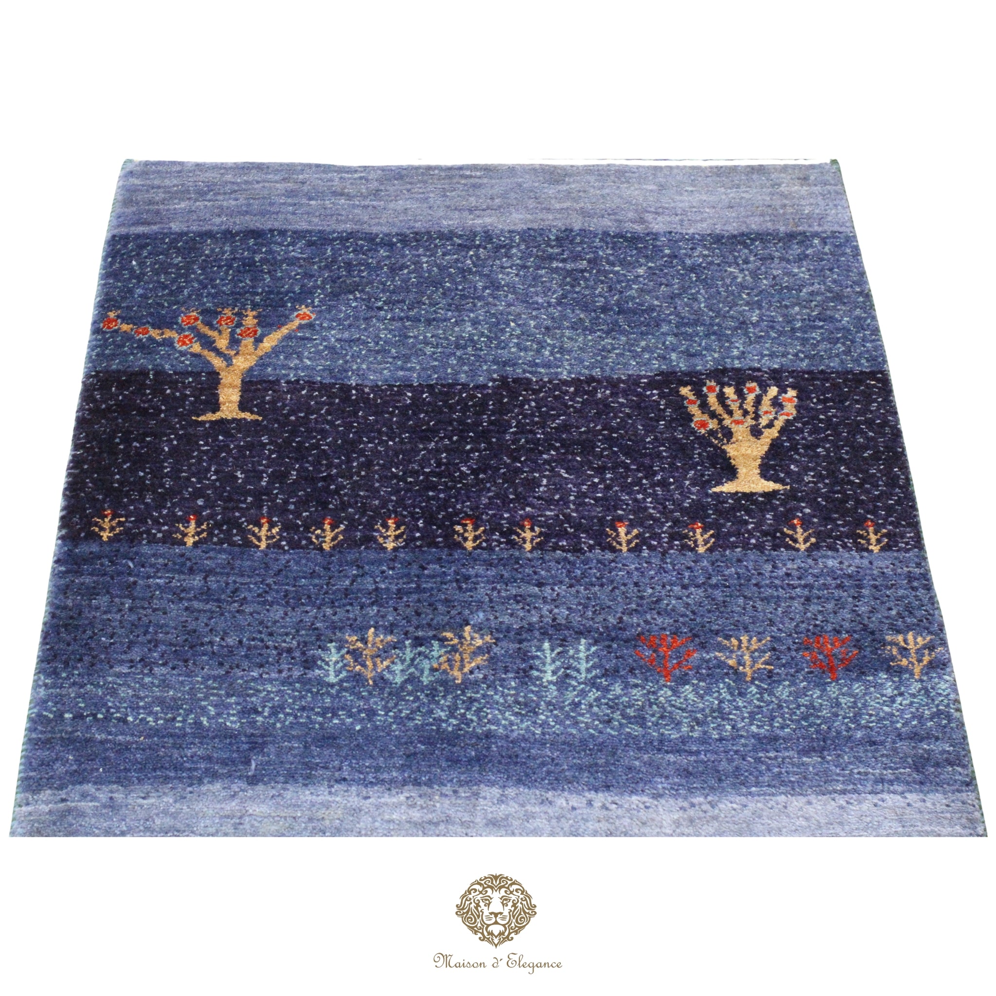 Blue textured rug with decorative patterns on a white background
