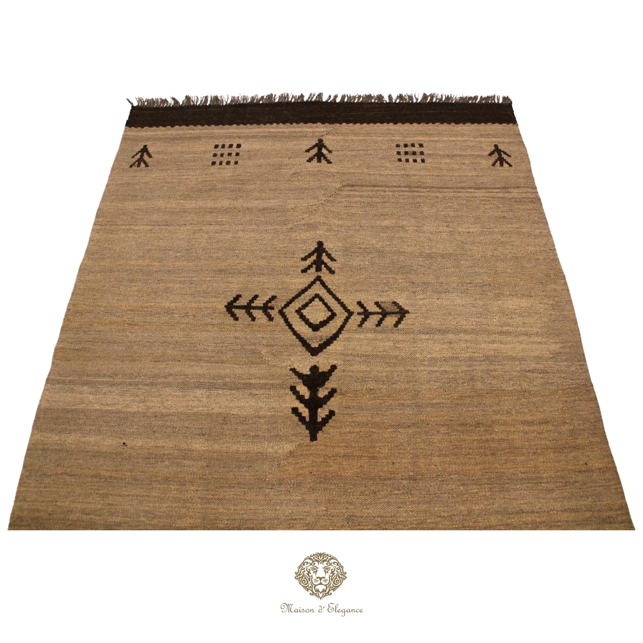 Brown woven rug with black patterns on a ivory background