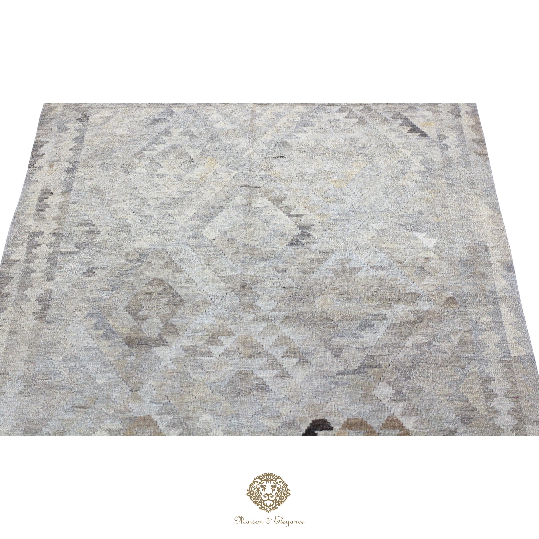 Kilim artesanal de tejido plano geométrico elaborado con lana pura y teñido naturalmente