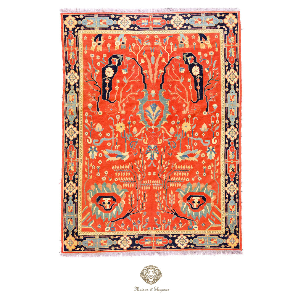 Decorative rug with intricate patterns on a red background