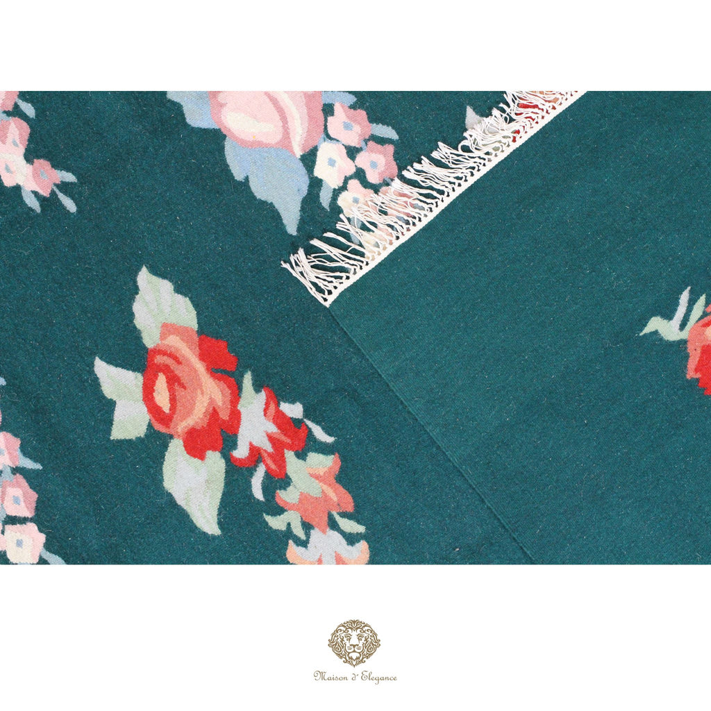 Floral patterned fabric with a visible brand logo at the bottom.