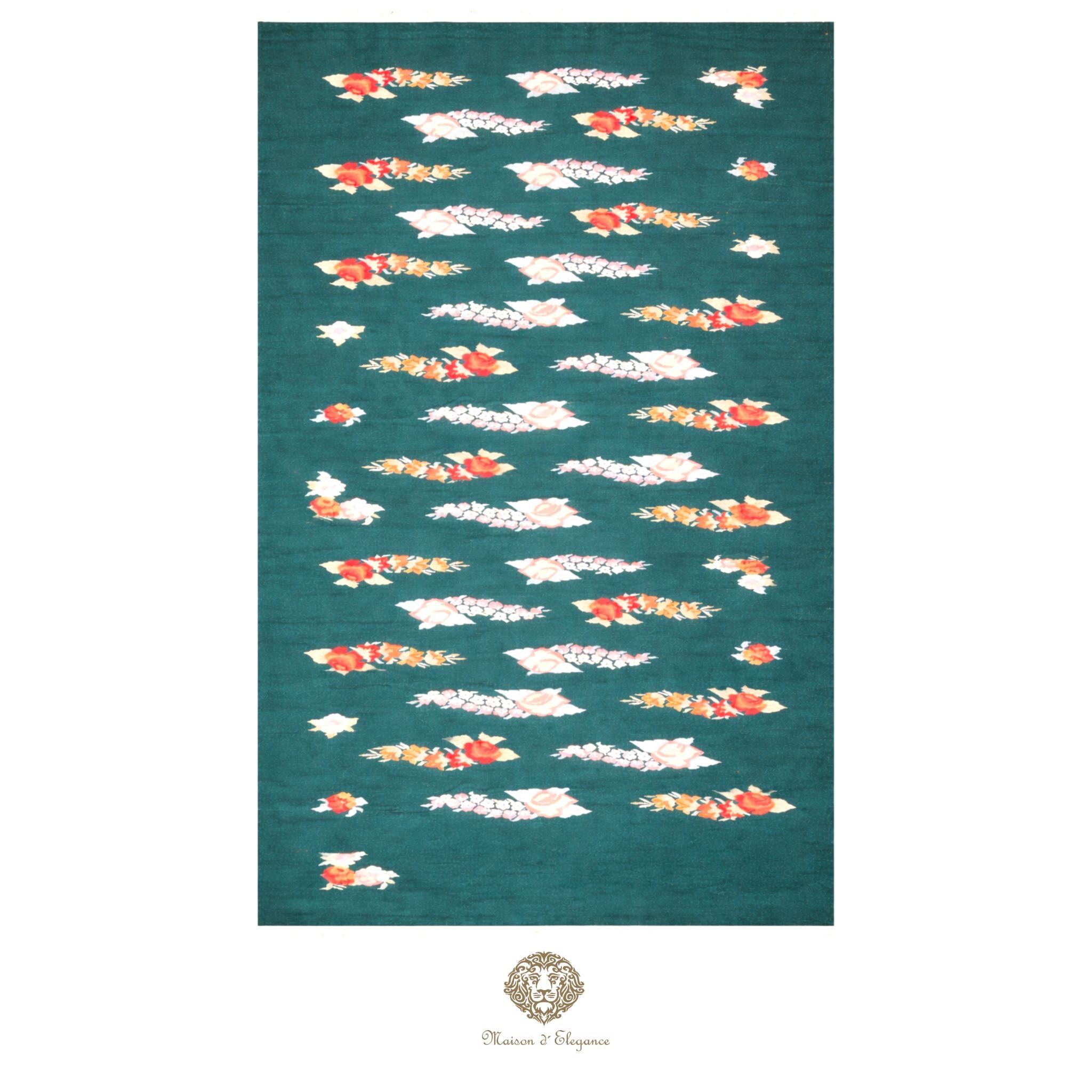 Teal rug with floral patterns on a green background
