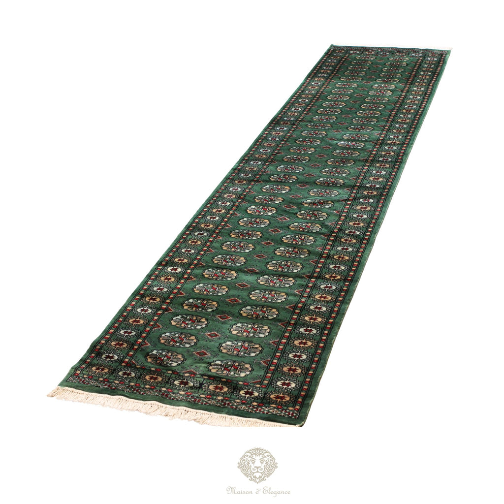Green patterned rug on a white background