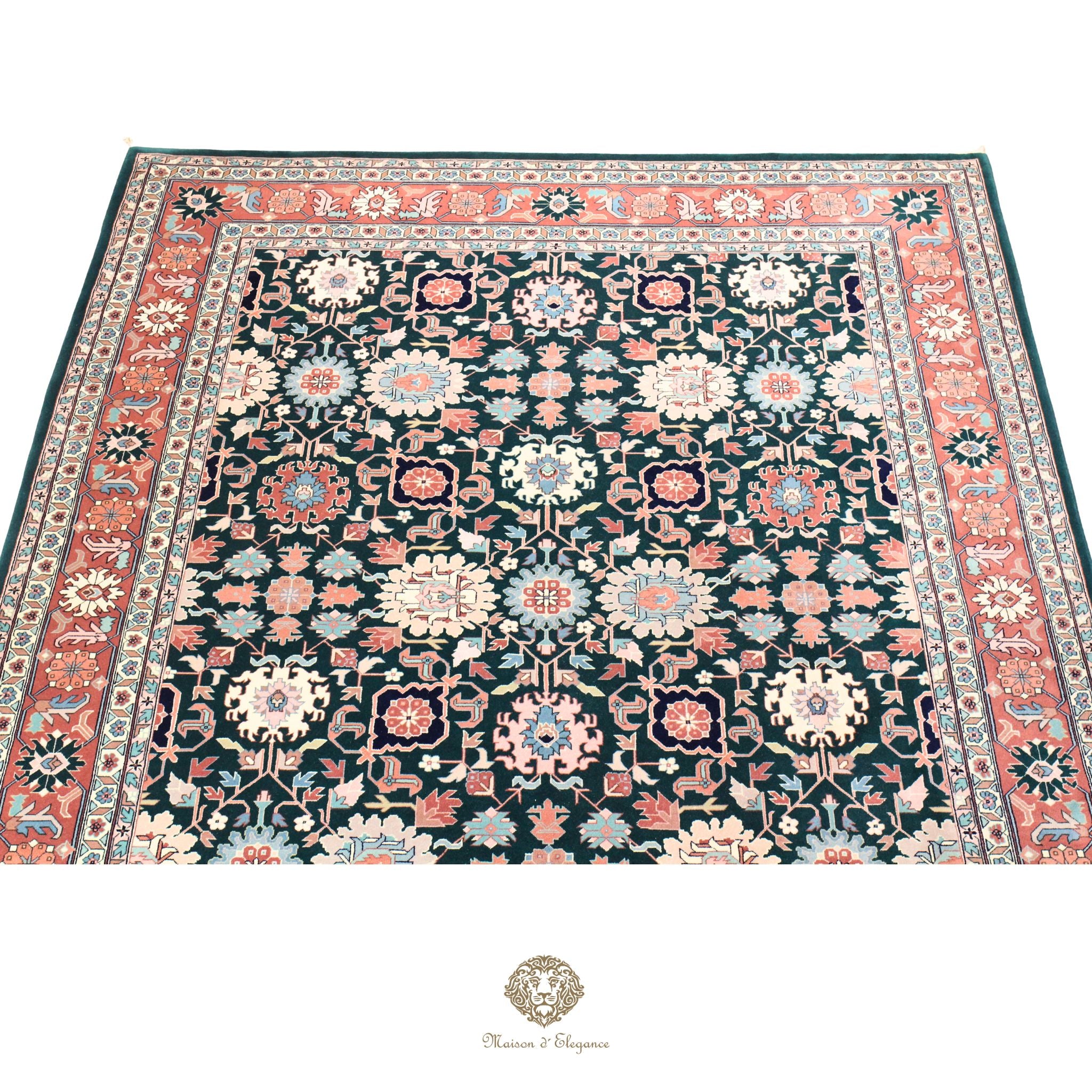Decorative rug with intricate patterns on a green background