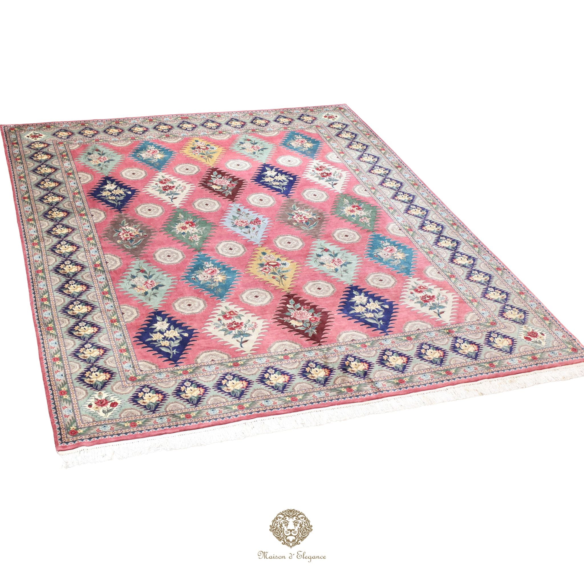 Decorative rug with a pink and multicolor pattern on a white background