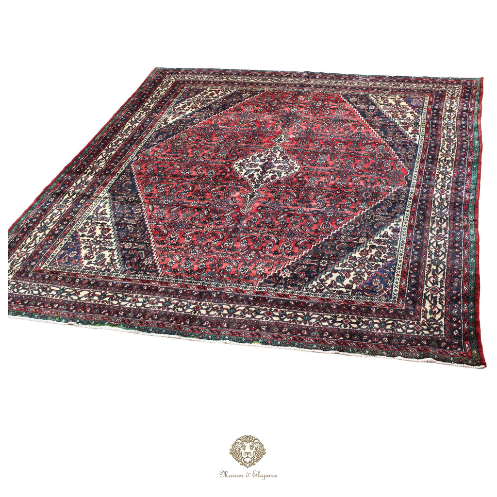 Decorative rug with intricate patterns on a red background