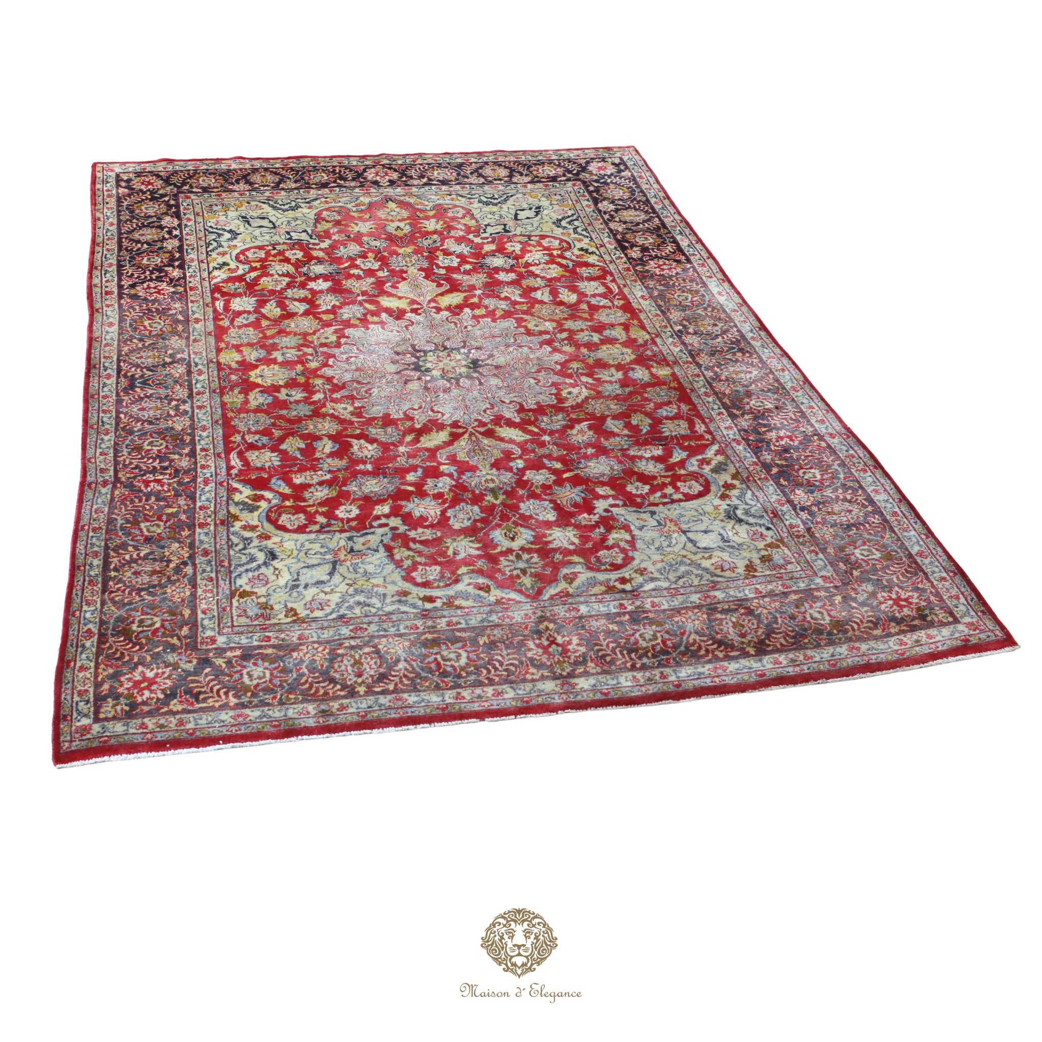 Decorative rug with intricate patterns on a red background